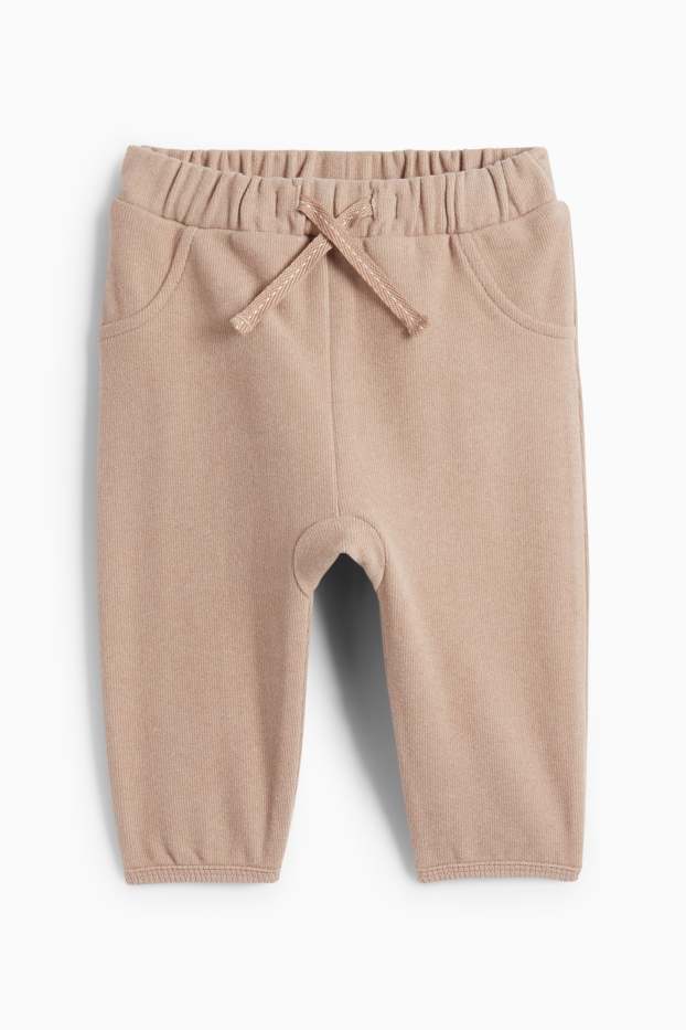 Unisex - Niemowlęce, ciepłe spodnie dresowe - beżowy