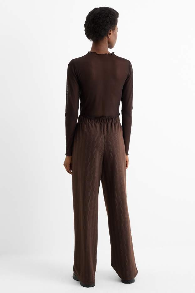 Dámské - Žerzejové kalhoty - mid waist - wide leg - s úzkými proužky - tmavohnědá