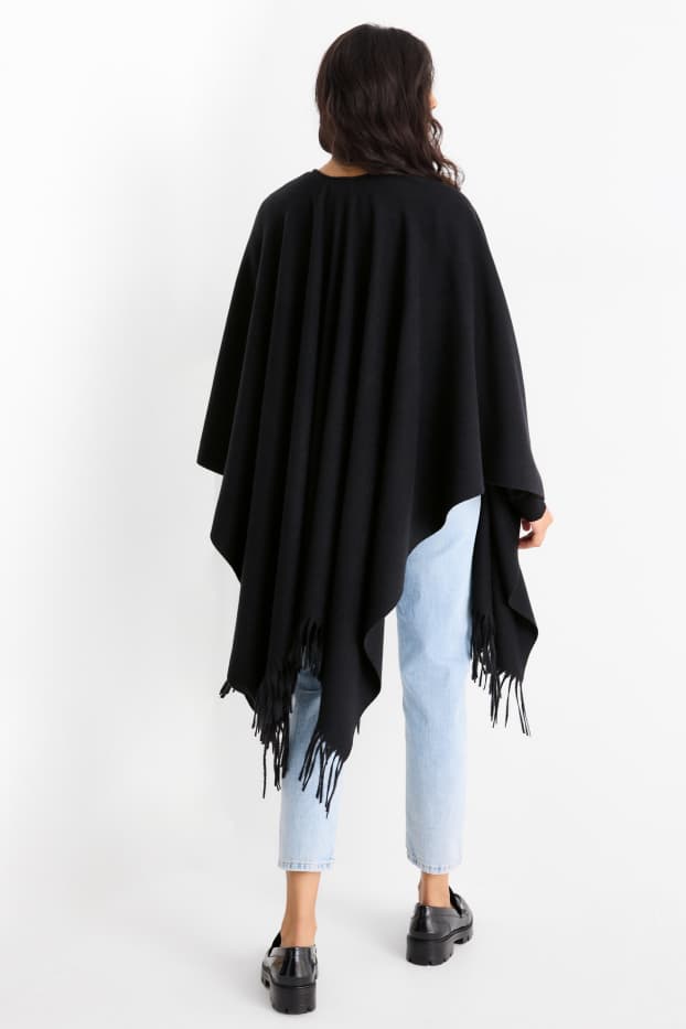 Dames - Poncho met franjes - zwart