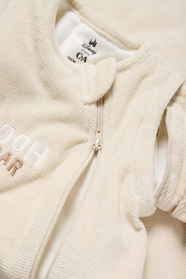 Baby: meisjes - Winnie de Poeh - babyslaapzak - 6 tot 18 maanden - geribd - licht beige