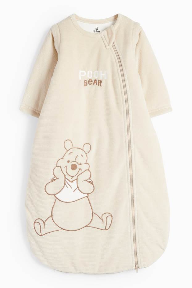 Baby: meisjes - Winnie de Poeh - babyslaapzak - 6 tot 18 maanden - geribd - licht beige