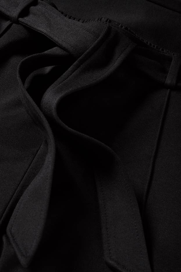 Women - Jersey trousers - mid-rise waist - flared fit - black