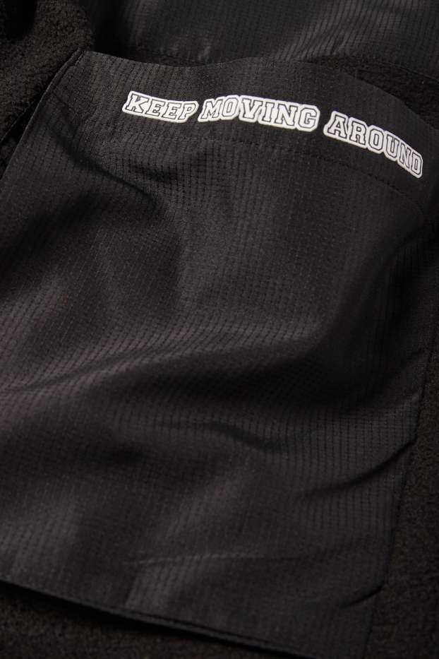 Nen - Pantalons de xandall cargo de teixit polar - negre