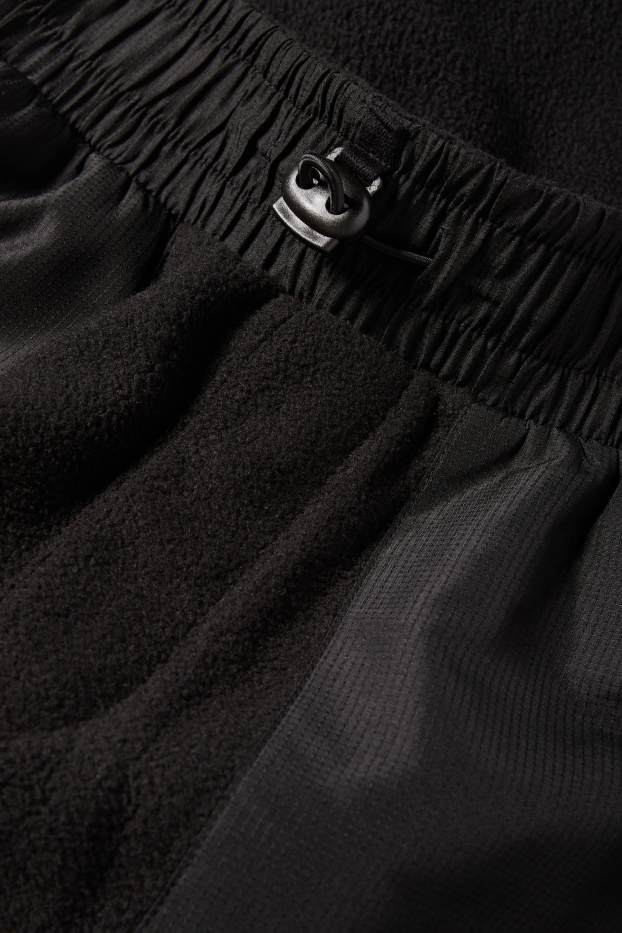 Nen - Pantalons de xandall cargo de teixit polar - negre