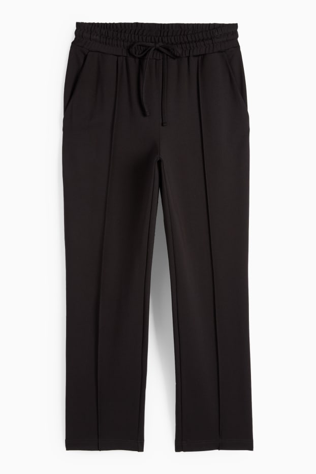 Femei - Pantaloni din jerseu - talie medie - tapered fit - negru