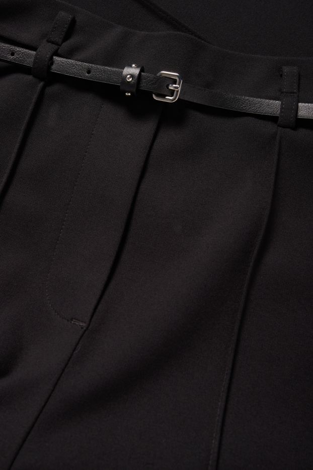 Dámské - Žerzejové kalhoty s páskem - mid waist - flared - černá