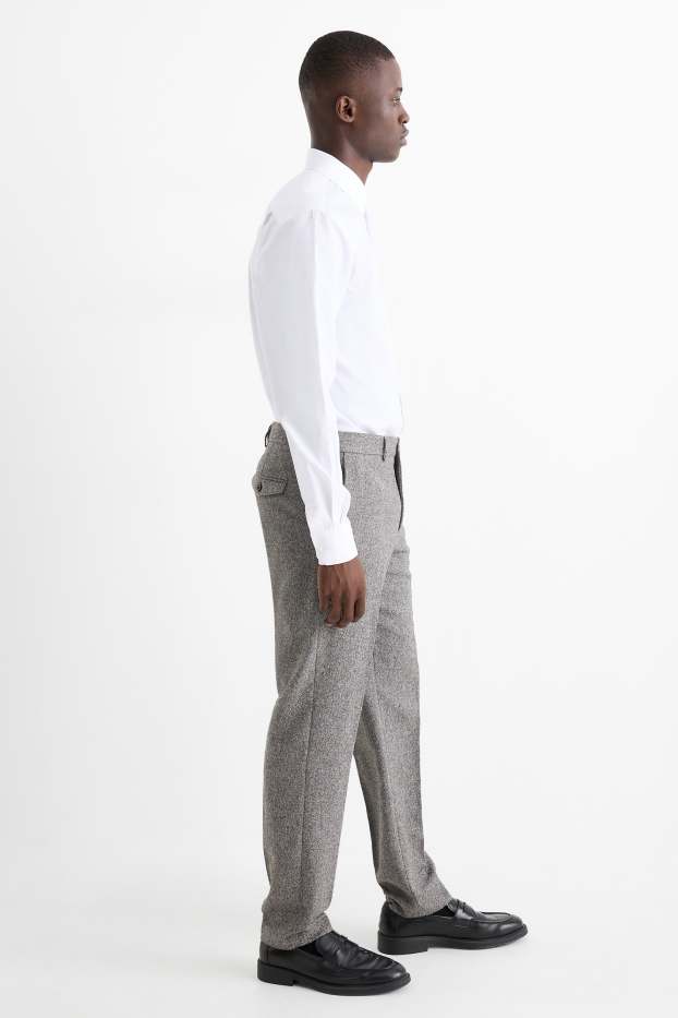 Hommes - Pantalon de costume - regular fit - extensible - finition texturée - gris