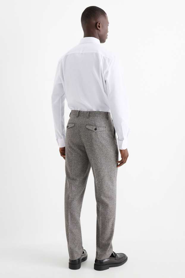 Hommes - Pantalon de costume - regular fit - extensible - finition texturée - gris