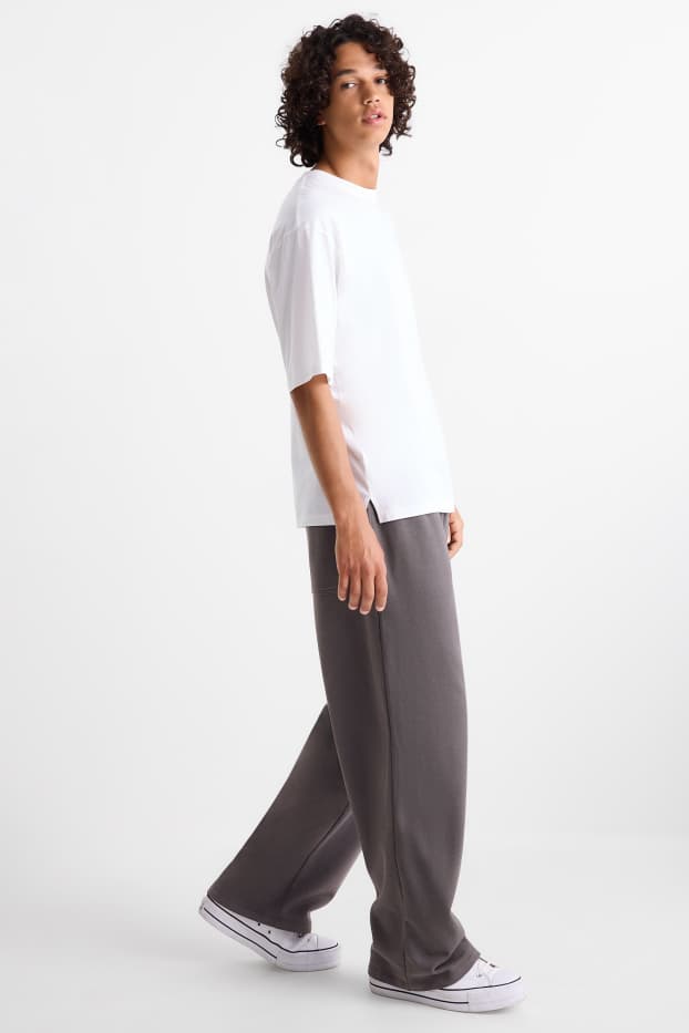Uomo - Pantaloni sportivi - grigio