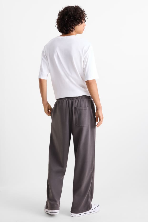 Uomo - Pantaloni sportivi - grigio