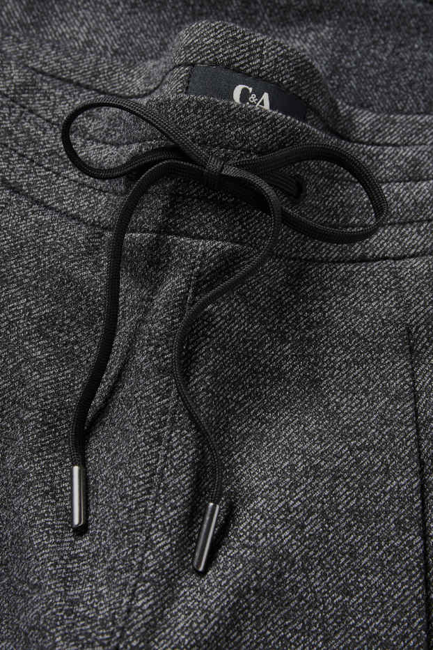 Dámské - Žerzejové kalhoty - mid waist - tapered fit - tmavošedá