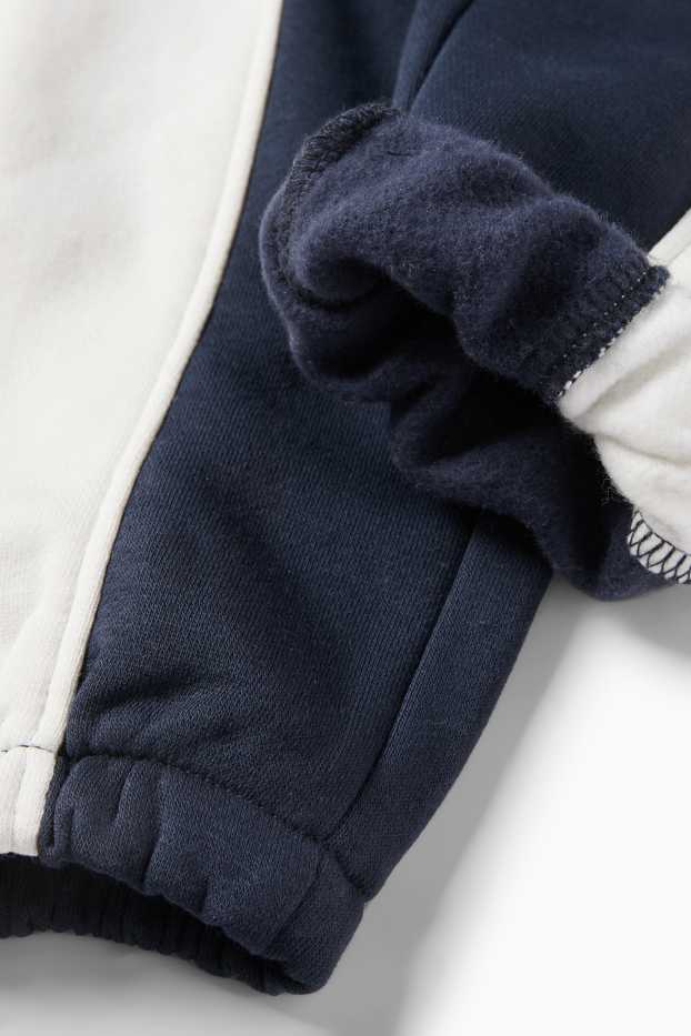 Děti - chlapci - Teplákové kalhoty - tmavomodrá