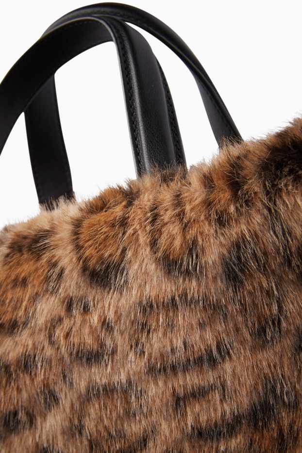 Damen - Kleiner Kunstfell-Shopper mit abnehmbarem Taschengurt - schwarz / beige