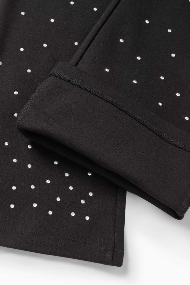 Enfants filles - Flared leggings avec pierres de strass - noir