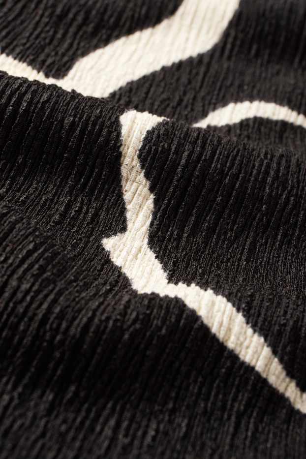 Femei - Fustă - cu flori - negru / alb