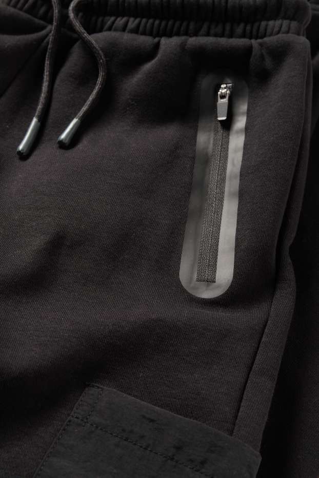 Děti - chlapci - Cargo teplákové kalhoty - černá