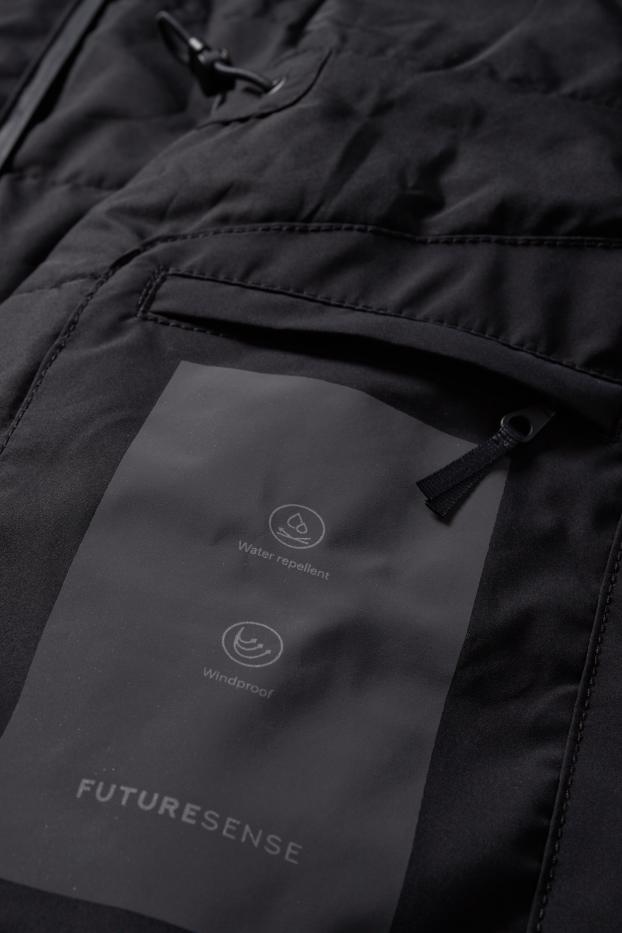 Dona - Jaqueta amb caputxa - folrada - impermeable - negre