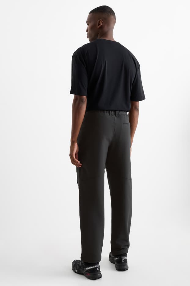 Men - Technical joggers - water-repellent - black