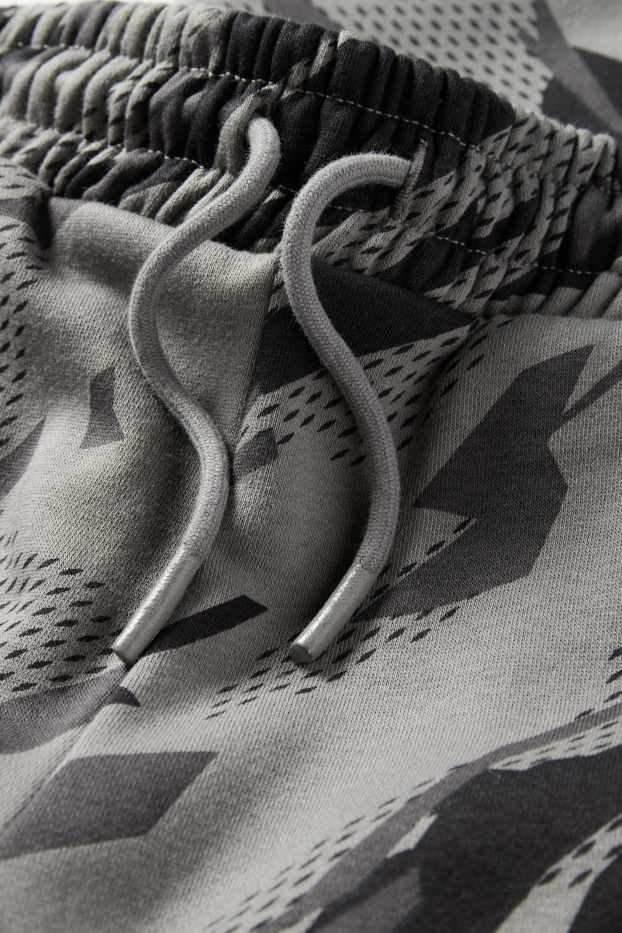 Děti - chlapci - Teplákové kalhoty - se vzorem - šedá/černá