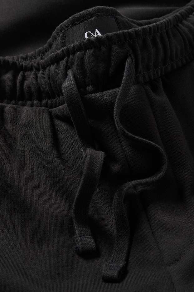 Pánské - Teplákové kalhoty - černá