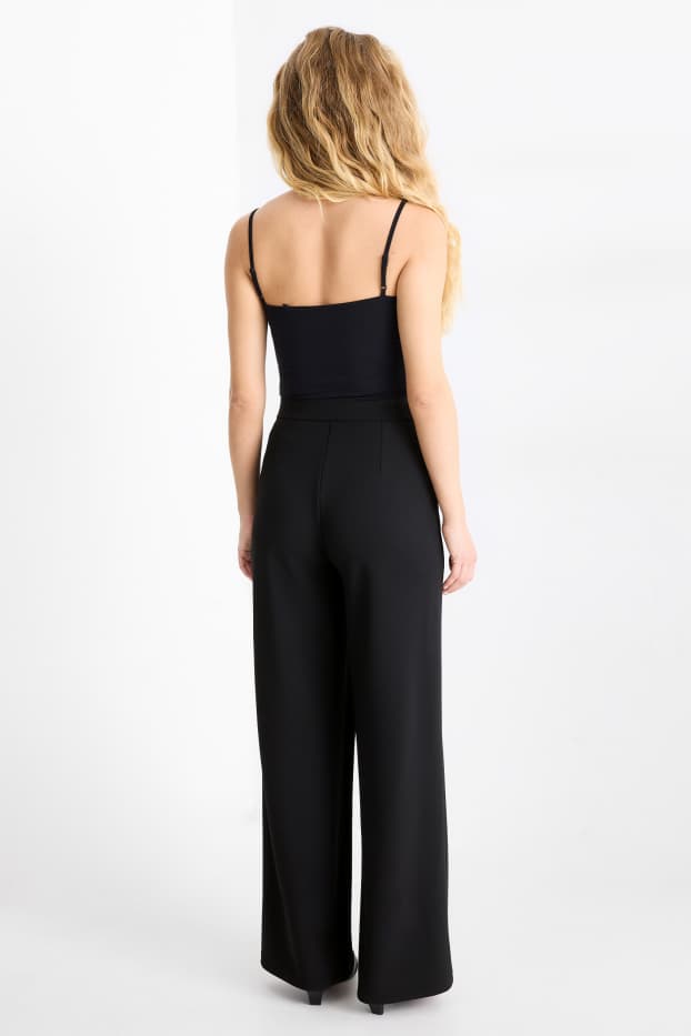 Donna - Pantaloni in jersey - vita media - gamba ampia - nero