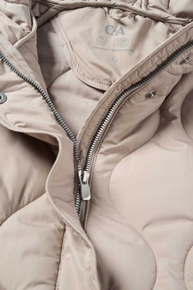 Dona - Abric embuatat amb caputxa - beix