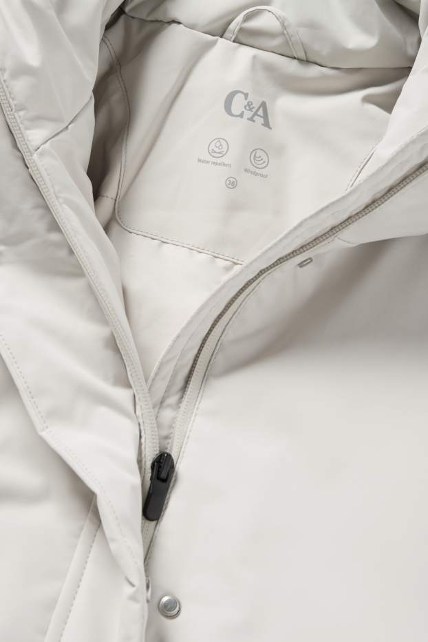 Femmes - Manteau à capuche doté d’une ceinture - rembourré - déperlant - gris clair