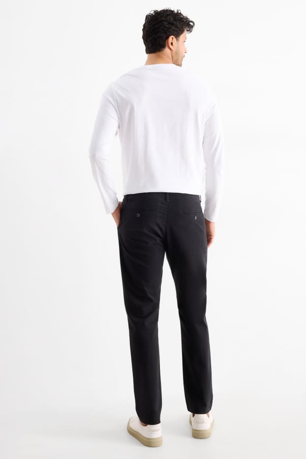 Uomo - Pantaloni chino - slim fit - nero