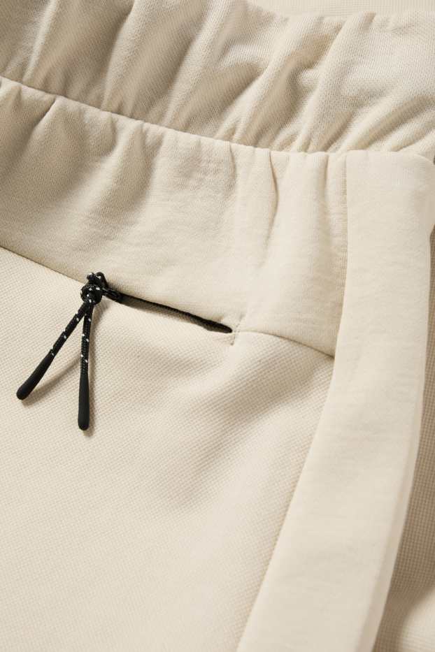 Pánské - Teplákové šortky - strukturované - světle béžová