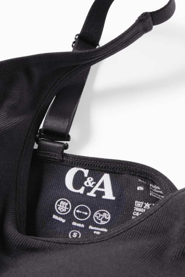 Damen - Sport-BH - wattiert - gerippt - seamless - schwarz