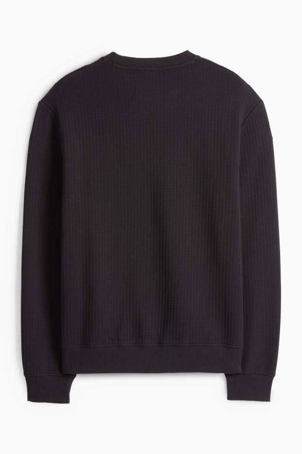 Home - Dessuadora - texturada - negre