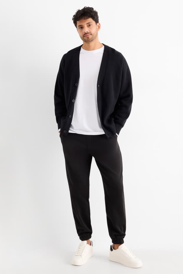 Uomo - Pantaloni sportivi - nero