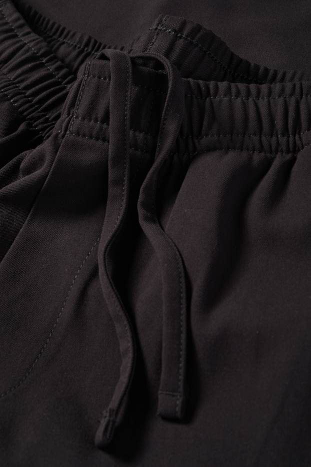 Bărbați - Chino - tapered fit - negru