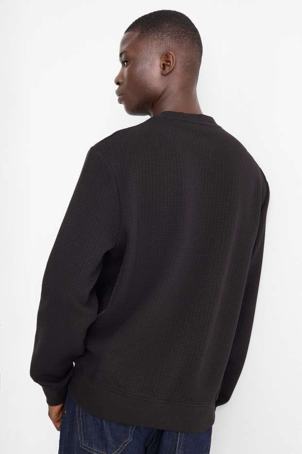 Home - Dessuadora - texturada - negre