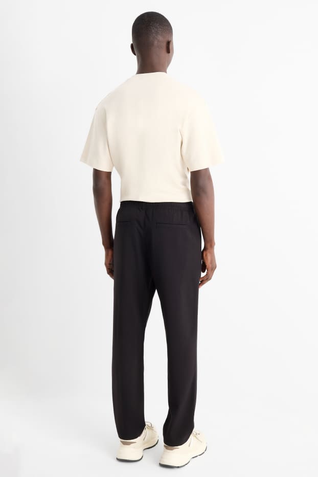 Bărbați - Chino - tapered fit - negru