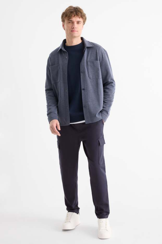 Home - Pantalons de xandall cargo - blau fosc