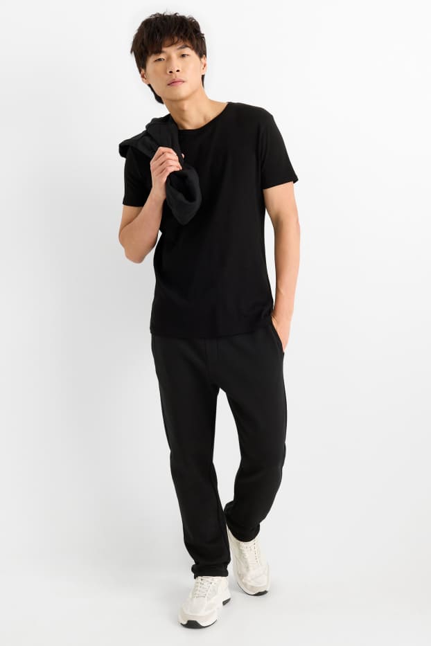 Bărbați - Pantaloni de trening - negru