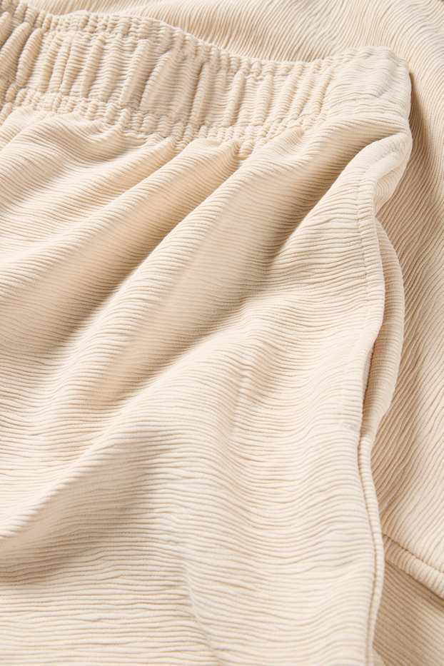 Femmes - Pantalon de jogging - finition texturée - beige clair