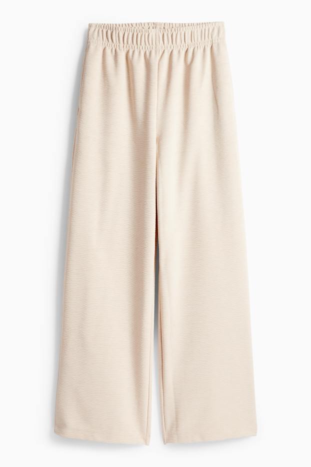 Femmes - Pantalon de jogging - finition texturée - beige clair