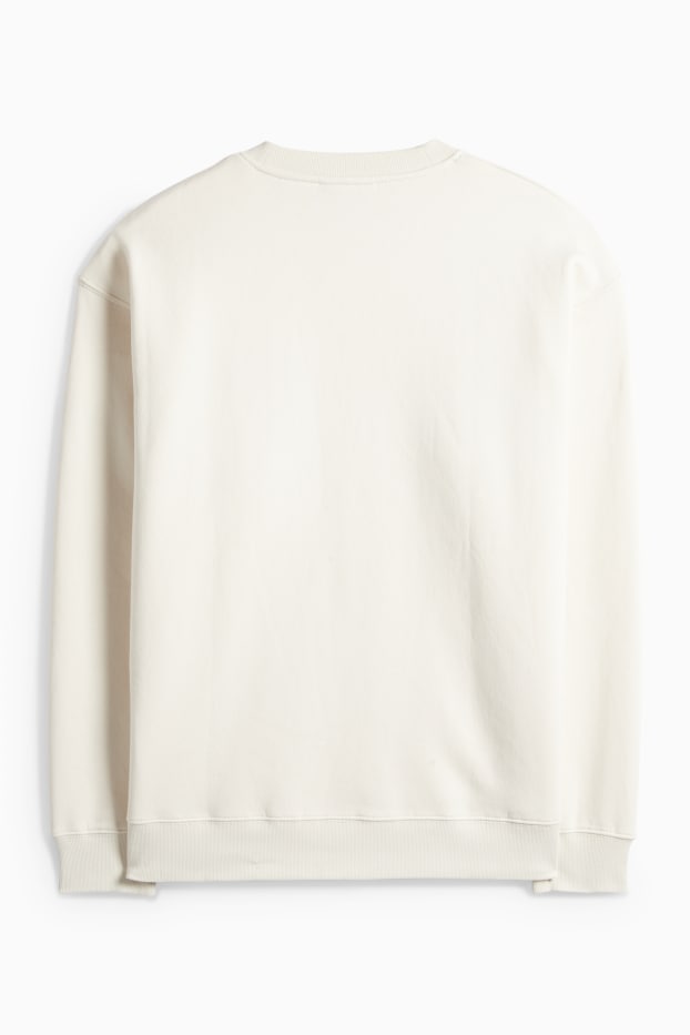 Home - Dessuadora oversized - beix clar