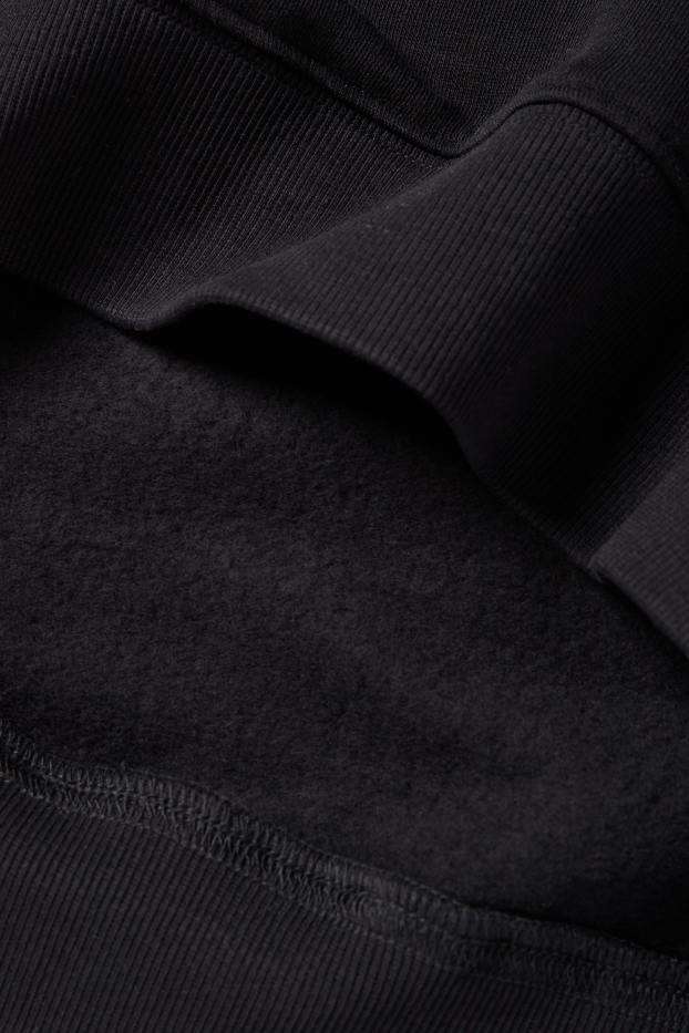 Home - Dessuadora oversized - negre