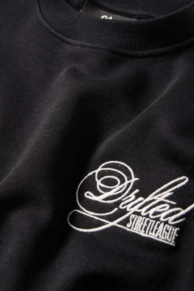 Home - Dessuadora oversized - negre