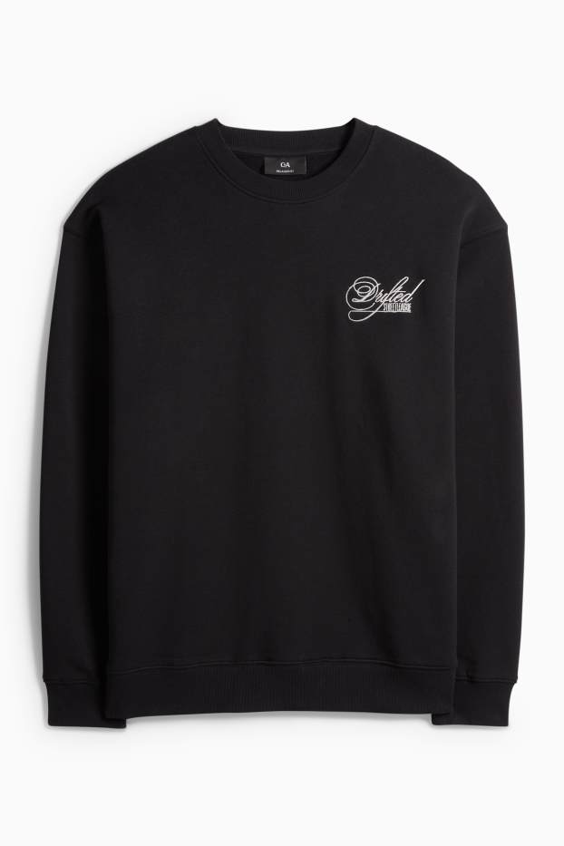 Home - Dessuadora oversized - negre