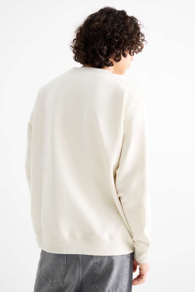 Home - Dessuadora oversized - beix clar