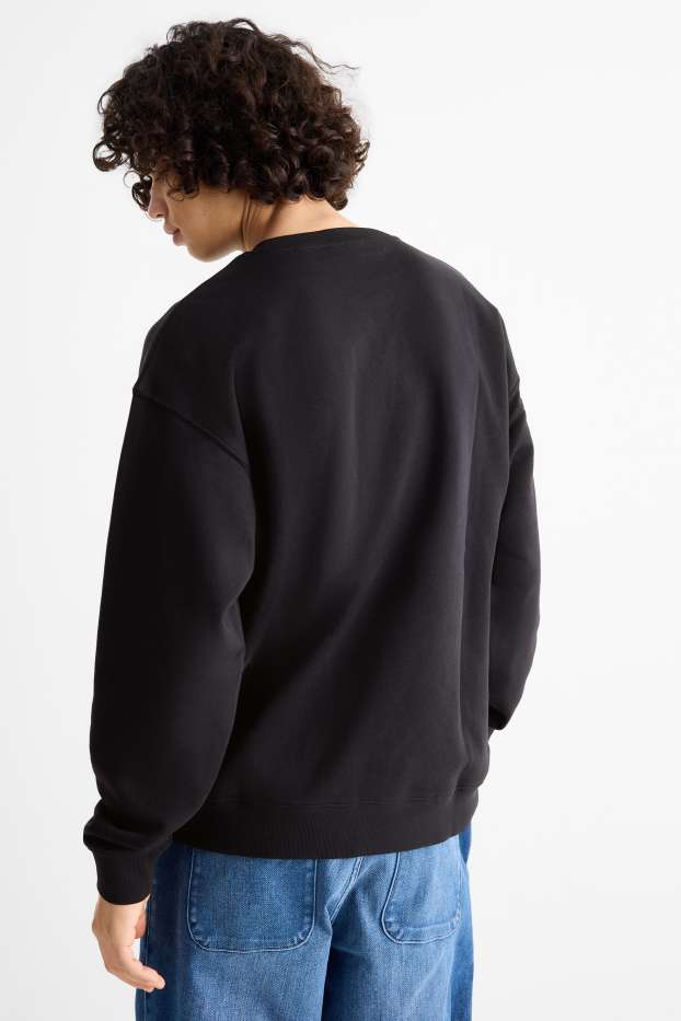 Home - Dessuadora oversized - negre