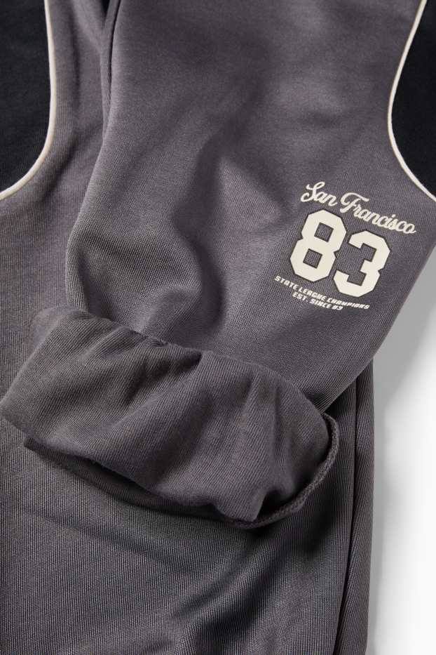 Děti - chlapci - Teplákové kalhoty - černá/tmavošedá