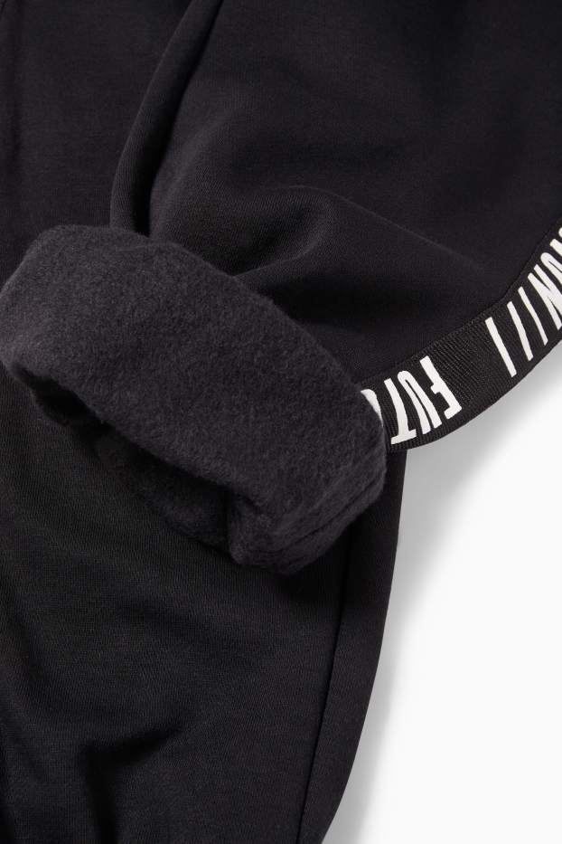 Děti - chlapci - Teplákové kalhoty - černá