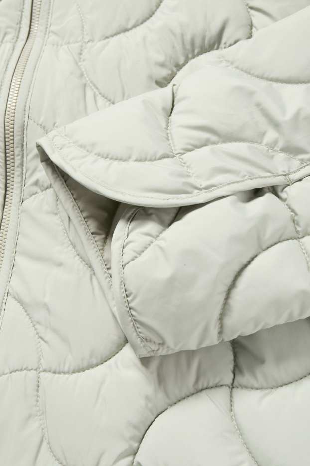 Femei - Geacă matlasată - verde deschis