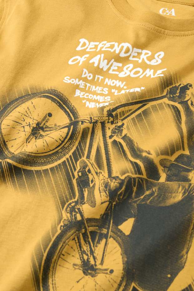 Kinderen: jongens - BMX - set - T-shirt en shorts - 2-delig - licht oranje