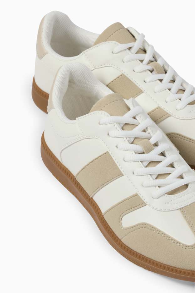 Femmes - Baskets - matière synthétique - blanc / beige